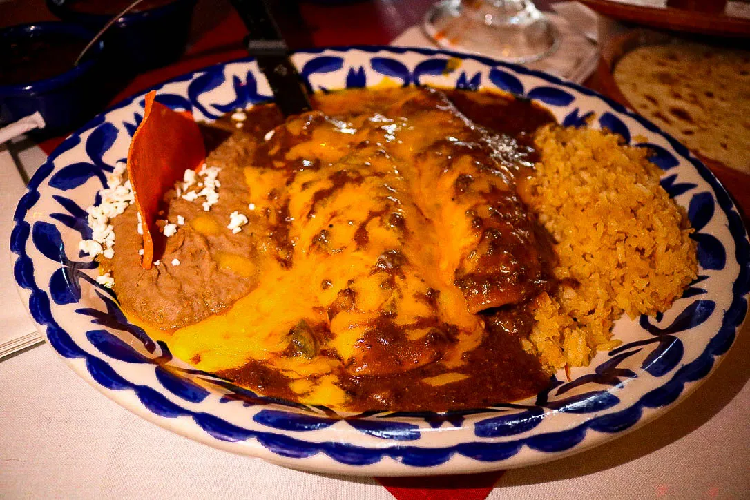 Mi Tierra Cafe y Panaderia signature dishes Cheese EnchiladasChile Con QuesoMenudo